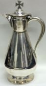 A novelty Victorian silver communion flagon / wine jug. London 1879. By Lamberts.
