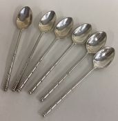 A set of six 19th Century Russian silver spoons of spiralled design. Marked 84.