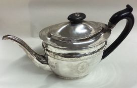 A large George III bright-cut silver teapot. London 1800. By John Emes.