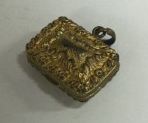 A Georgian gilt metal vinaigrette.