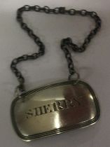 A Victorian silver wine label for 'Sherry'. Birmingham 1853.