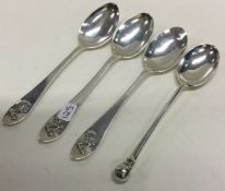 A set of three shaped silver teaspoons with bowling terminal together with a nail top example.