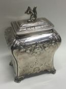 An 18th Century George III silver tea caddy with squirrel finial. London 1765.