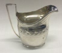 A good Georgian silver bright-cut cream jug. London. By DF.