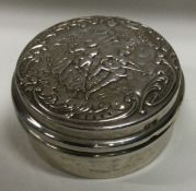 A chased Victorian silver box with embossed decoration. Birmingham 1900.