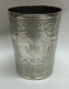 An engine turned French silver beaker.
