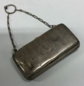 A silver purse with engine turned decoration. Birmingham 1914.