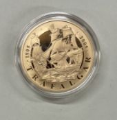A 2005 Battle of Trafalgar five pound Proof coin.