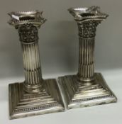 A pair of stylish Corinthian column design silver candlesticks. Sheffield 1921.