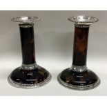 A fine pair of Victorian silver and tortoiseshell candlesticks. London 1890.