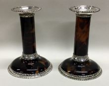 A fine pair of Victorian silver and tortoiseshell candlesticks. London 1890.
