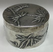 WANG HING: A Chinese export silver snuff box with lift-off lid embossed with bamboo.