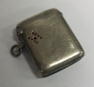 CHESTER: A silver jewelled vesta case fashioned with the letter 'H'. 1899.