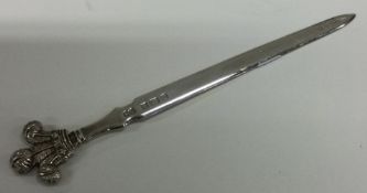 A 'Prince of Wales' silver letter opener. Birmingham 1965. By Hampton.