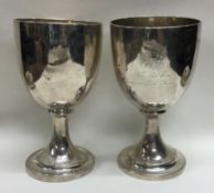 A pair of George III inscribed silver goblets. London 1816.
