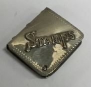 A novelty silver stamp case. Marked to interior.