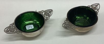 A good pair of silver pierced salts with green glass liners. Birmingham.