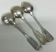 EDINBURGH: A group of three silver fiddle pattern teaspoons. Various dates and makers.