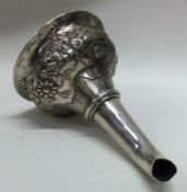 An 18th Century chased silver crested wine funnel.