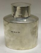 A silver tea caddy. Birmingham 1911. By CW.