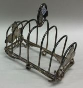 A rare novelty Victorian silver toast rack. Birmingham 1849. By Yapp & Woodward.