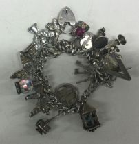 A novelty silver charm bracelet.