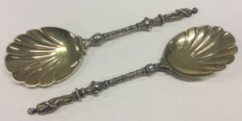 A good pair of cast silver gilt preserve spoons. London.