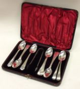 A good set of twelve Georgian style silver teaspoons together with tongs.