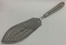 A Georgian silver fish slice. London 1784. By Robert Hennell.