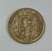 An 1892 Jubilee shield back half Sovereign.