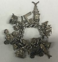 A novelty silver charm bracelet to commemorate the Queen's Jubilee.