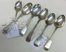 EXETER: A collection of nine silver fiddle pattern teaspoons.