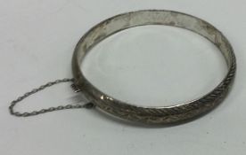 An engraved silver child's bracelet. London 1970.