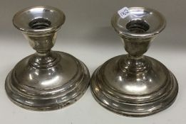 A good pair of American silver candlesticks.