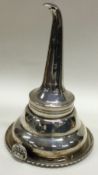 A good quality George III silver wine funnel.