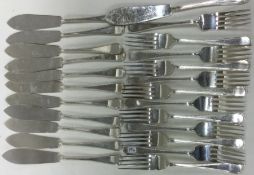 A good set of twelve plus twelve silver bead edge knives and forks. Sheffield 1963.
