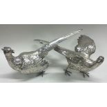 A fine and heavy pair of cast silver pheasants. London 1971.