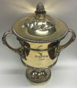 A large fine quality silver gilt racing cup with reeded body and lift off cover. London 1920.