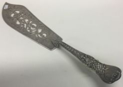 A Victorian Coburg pattern silver fish slice. London 1855.