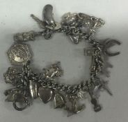 A novelty silver charm bracelet.