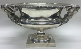 A large fine quality silver Warwick vase attractively decorated with reeded handles to square base.