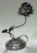 A novelty Victorian silver flower chamberstick. London 1890. By James Deakin & Sons.