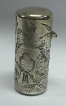 A Victorian scent bottle engraved with birds on trees. London 1882.