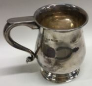 A silver baluster shaped pint mug. Birmingham 1961.