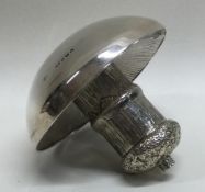 A novelty Victorian silver lighter in the form of a mushroom. London 1888.