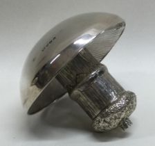 A novelty Victorian silver lighter in the form of a mushroom. London 1888.