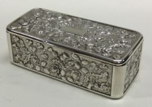A William IV silver snuff box embossed with thistles and flowers. London 1833.