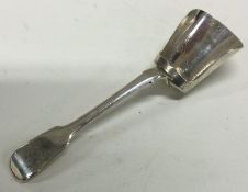 A Georgian silver scoop. London 1828.