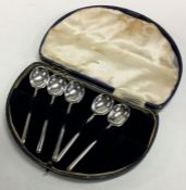 A heavy set of five silver coffee spoons of tapering form. Sheffield.