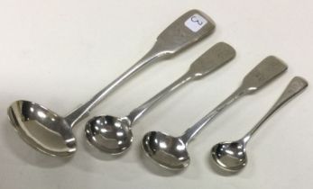 EXETER: A fiddle pattern silver cream ladle together with salt spoons etc.